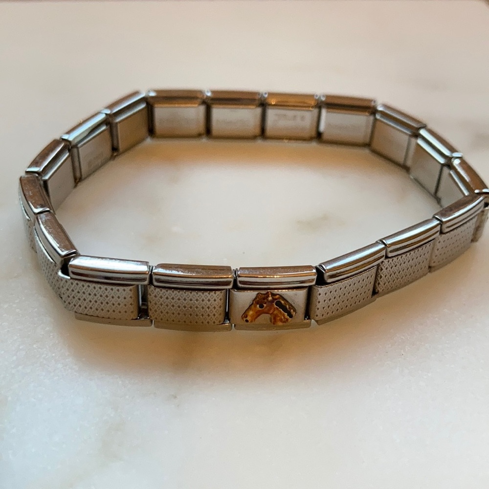 Zoppini stainless steel stretch bracelet 4 charms
